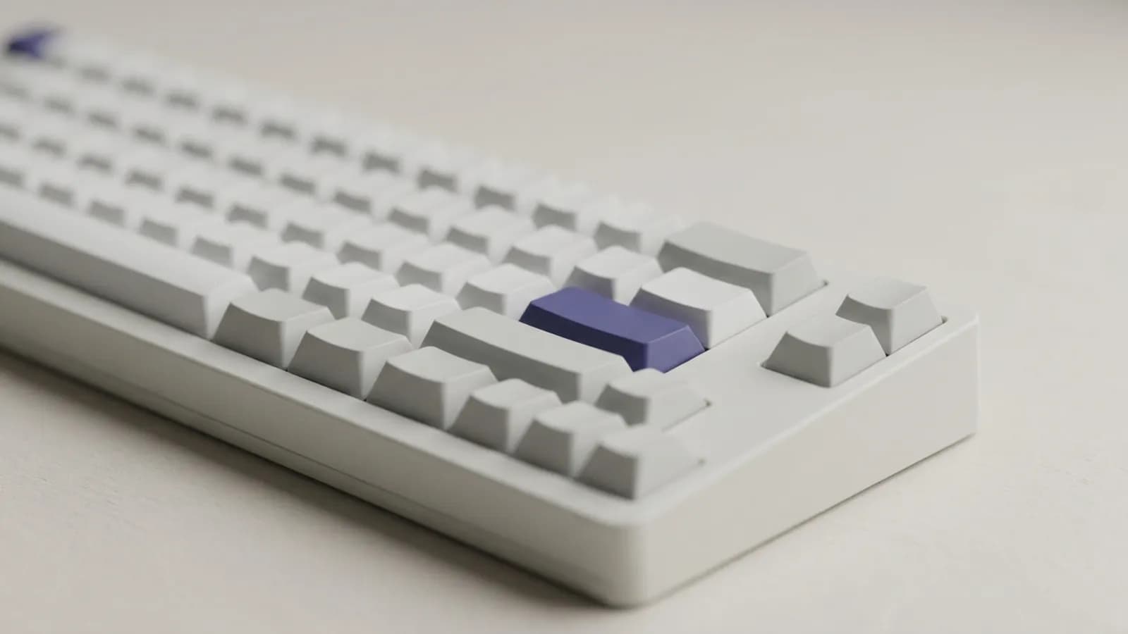 Close-up of a mechanical keyboard with blank keycaps