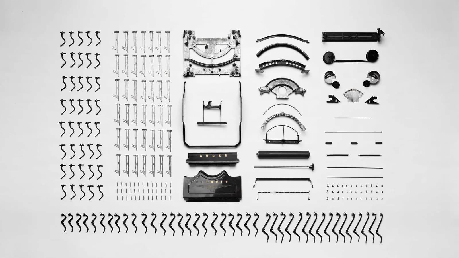 A printed sheet of typographic ornaments and symbols arranged in rows